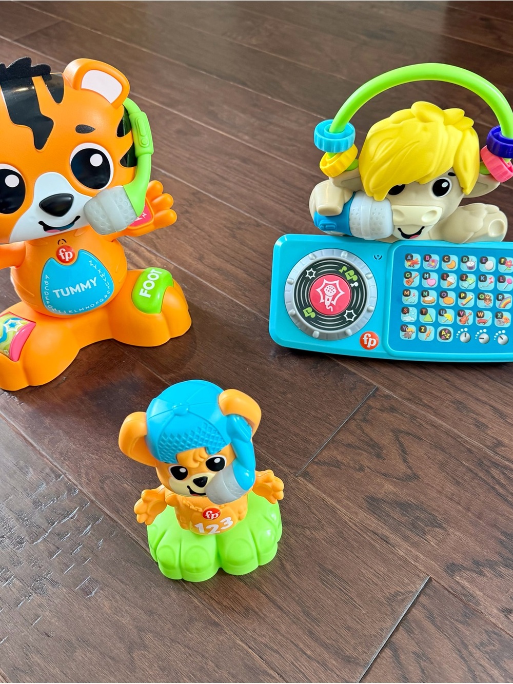 Fisher-Price Interactive Orange Tiger, Blue Puppy & Yellow Lion Learning Set